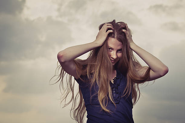istock Young smiling woman with long hair 184360555