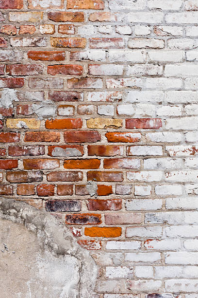 istock A very old brick wall with fading color 184360584