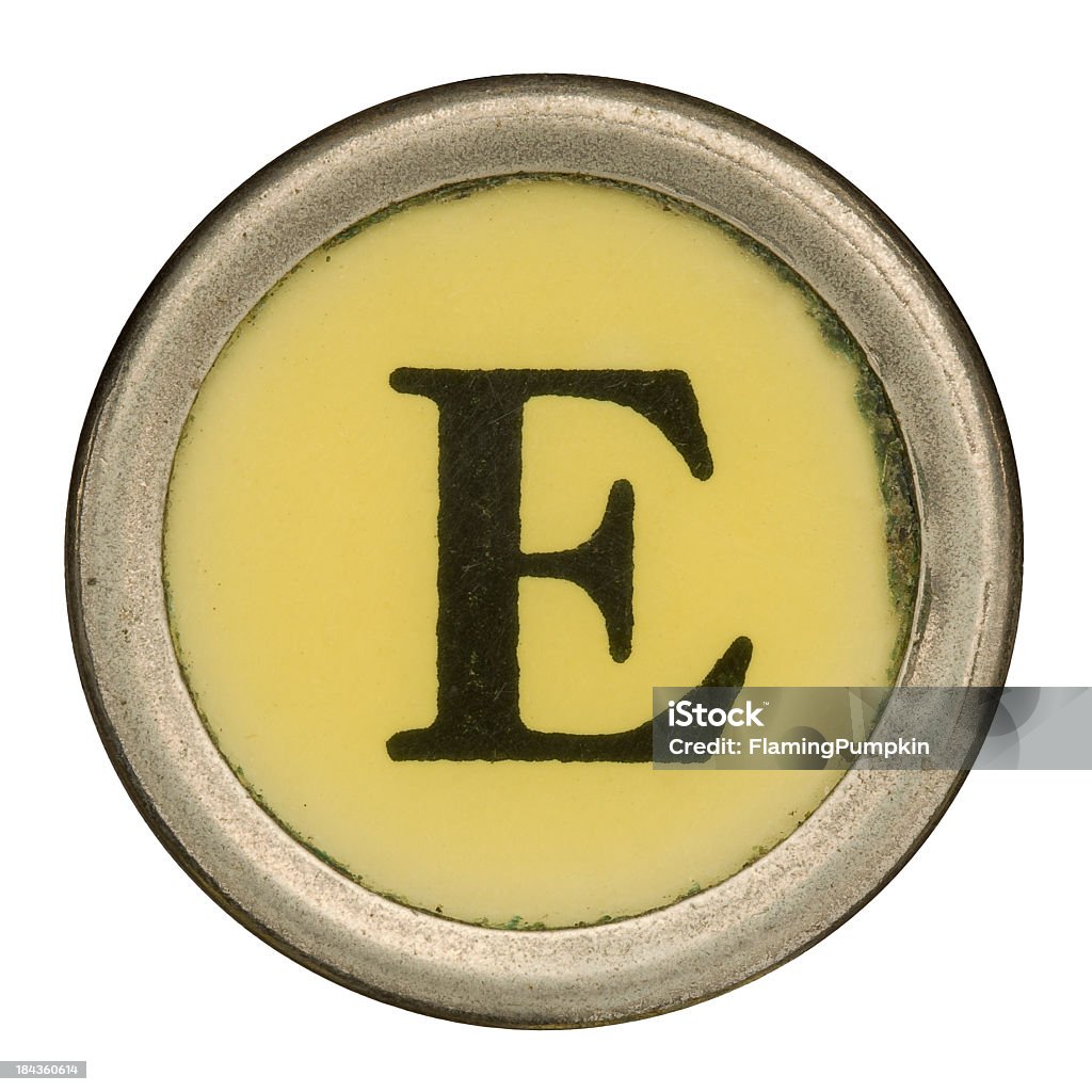 Alphabet - Letter E from old Manual Typewriter. Part of a series of the entire Alphabet, each individual letter is over tall. Wonderful character to this set - each letter is cut from wood and there is ground-in ink and stains on the backer block. Each letter has different grain and color due to it's usage... Alphabet Stock Photo