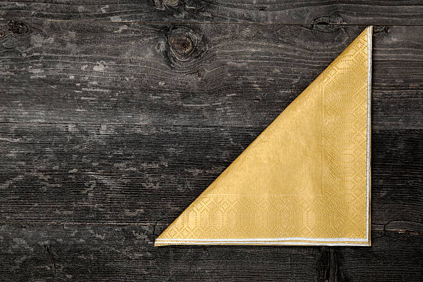 istock Napkin on wooden table 184360637
