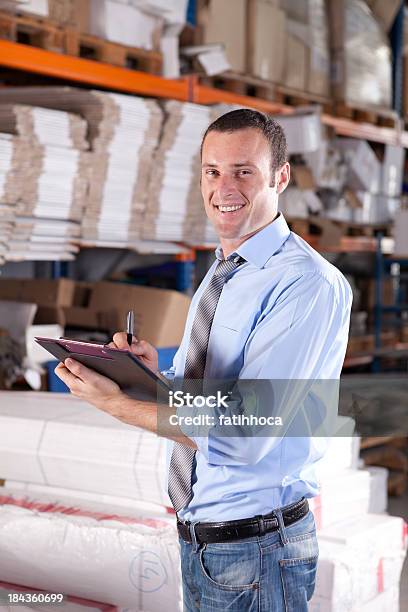 Young Warehouse Businessman Stock Photo - Download Image Now - Businessman, Freight Transportation, Warehouse