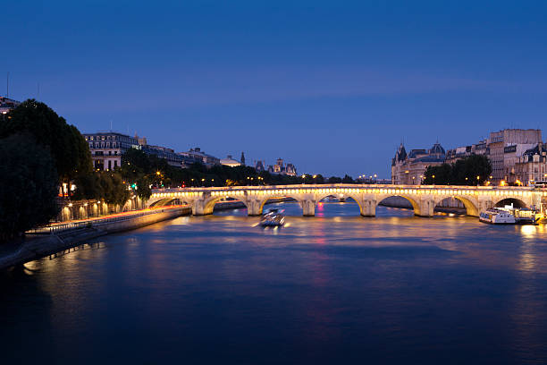 istock The River Seine and Pont Neuf at dusk in Paris 184360710