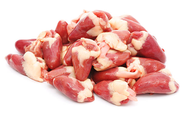 Raw chicken hearts isolated on white Raw chicken hearts isolated on white animal internal organ stock pictures, royalty-free photos & images