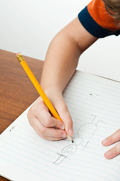istock little kid drawing funny cartoon 184361158