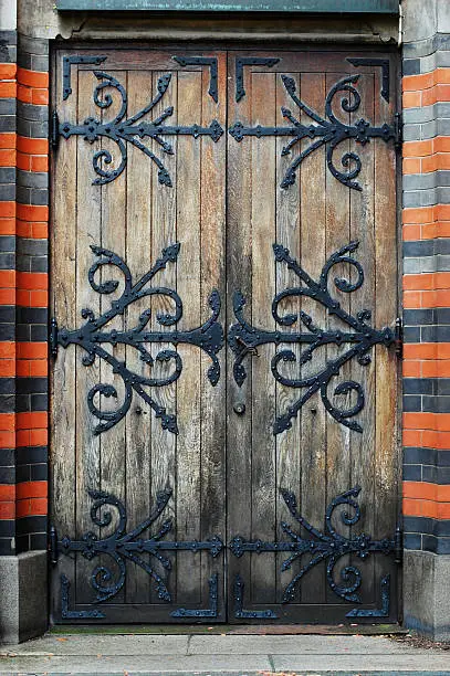 "A rear entrance door to the Allhelgonakyrkan built in 1891 in Lund, Sweden."