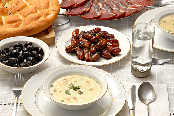 Middle Eastern Cuisine "Ramadan foods. Sliced pastirma, pita, dried date..Pastirma is dried meat which is traditional food of Kayseri, Turkey. The month of Ramadan is fasting time in Muslims countries all over the world. Itaas an important worship for Muslims" pastrami photos stock pictures, royalty-free photos & images