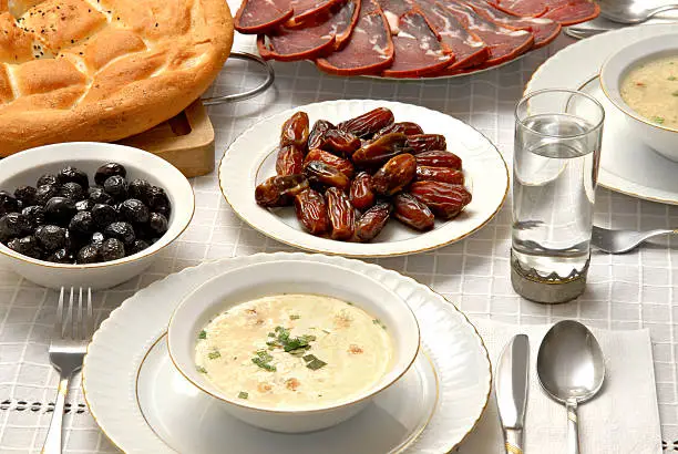 "Ramadan foods. Sliced pastirma, pita, dried date..Pastirma is dried meat which is traditional food of Kayseri, Turkey. The month of Ramadan is fasting time in Muslims countries all over the world. Itaas an important worship for Muslims"