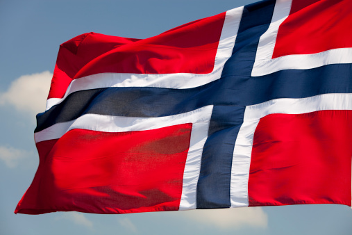 The flag of Norway waving in the wind.
