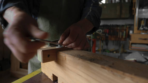 istock Carpenter working in his workshop.Small business owner. 1843619774