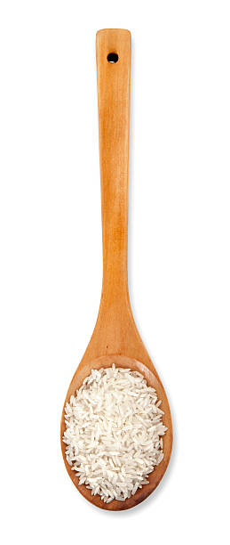 istock Rice grain in wooden spoon 184362206