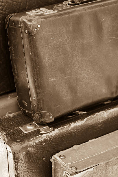 istock Vintage luggage sepia toned 184362628