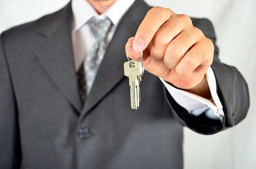 Businessman holding key