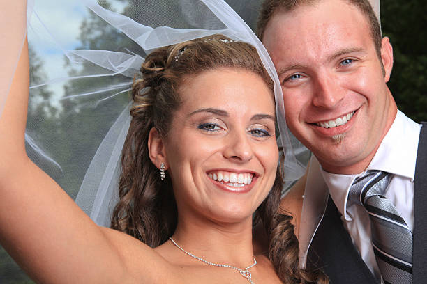 istock Fantastic Wedding - Put Up Veil Couple 184363513