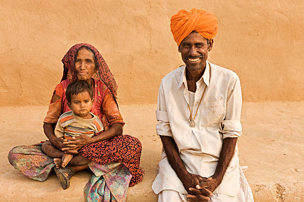 istock Rajasthani grandparents with young boy. 184363813