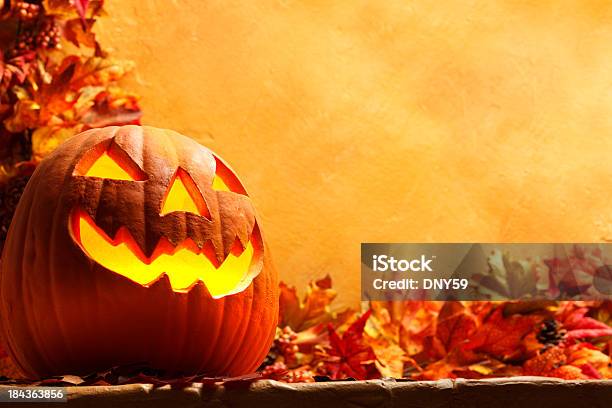 Jack O Lantern In An Autumn Setting Stock Photo - Download Image Now - Halloween, Border - Frame, Celebration Event