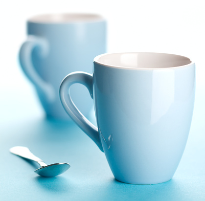 Two blue coffee cups