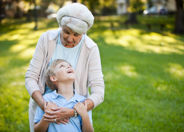 istock Grandmother hugging grandson 184364270