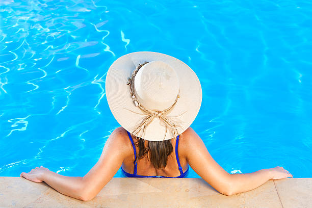 istock Enjoyment In The Swimming Pool 184364279