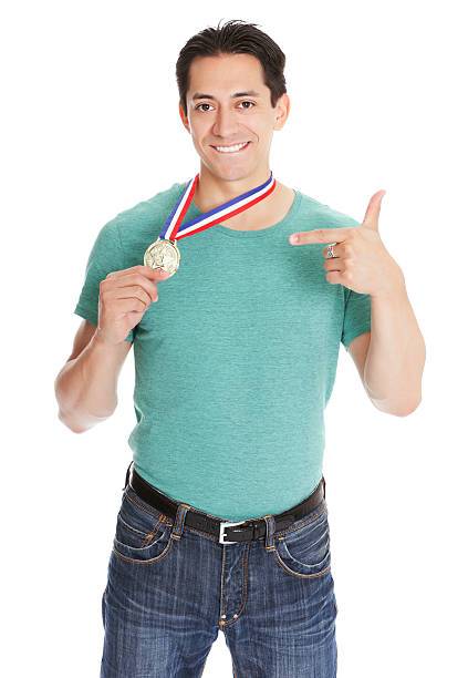 istock Cheerful man pointing at his medal 184364430
