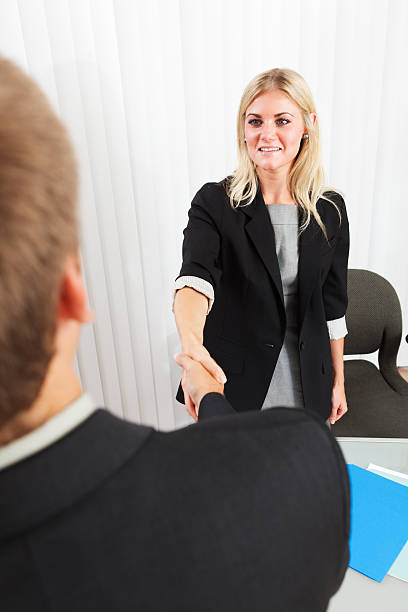 istock Business Persons Shaking Hands in Meeting 184364479