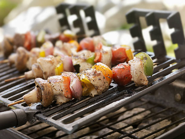 istock Chicken and Vegetable Kabobs on a Outdoor BBQ 184364932