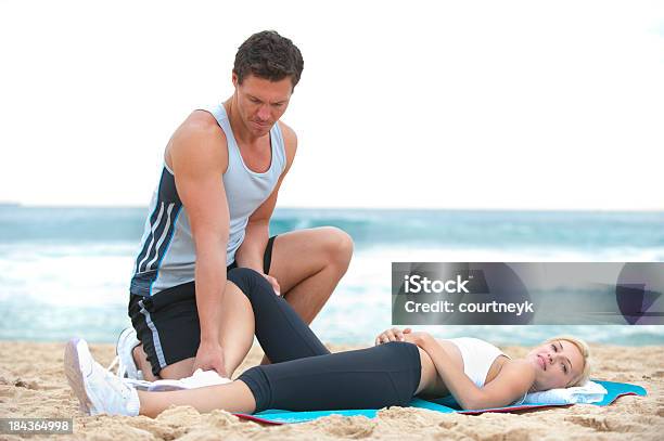 Woman Receiving Physical Therapy Stock Photo - Download Image Now - 20-29 Years, 30-39 Years, Active Lifestyle