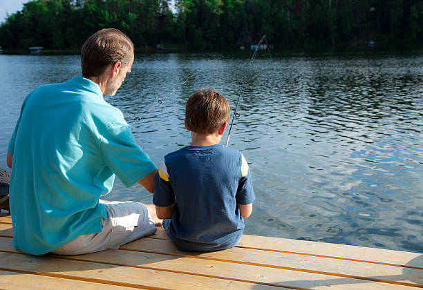 istock Father and Son Fishing 184365330