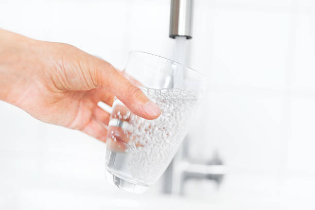 istock Filling up a clear glass of water 184365508
