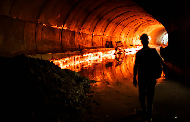 istock A silhouette of a man in a subway 184366247