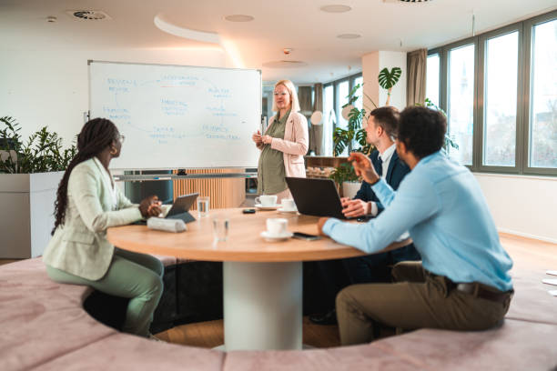 istock Multiracial Colleagues Collaborating on New Product Development in Office Meeting 1843663559