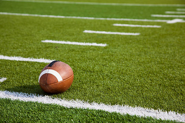 istock An American football on field 184367885