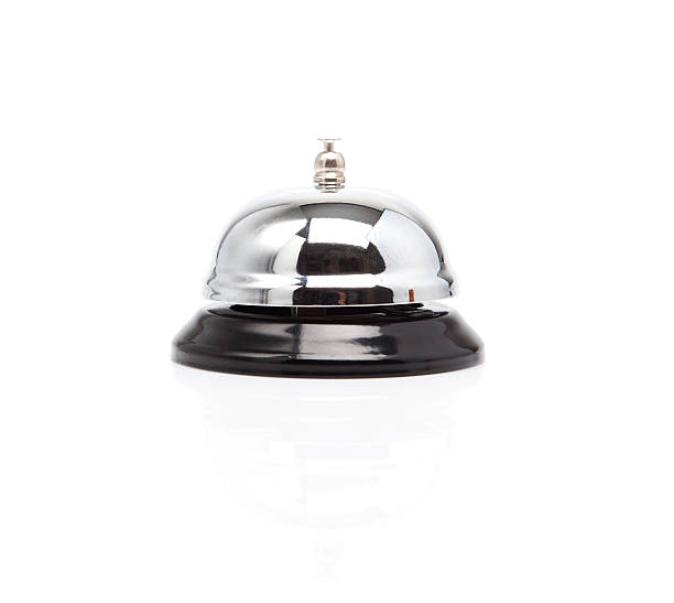 Service Bell. Profile of shiny service bell on white background. hotel occupation concierge bell service stock pictures, royalty-free photos & images