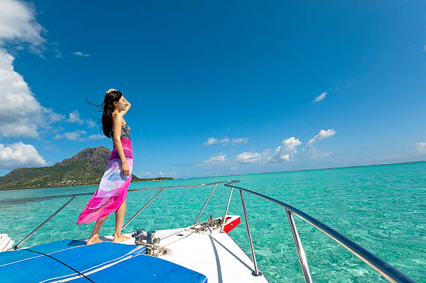 istock Girl standing on boat 184370238