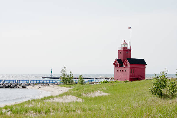istock Big Red Lighhouse by Sea 184370682