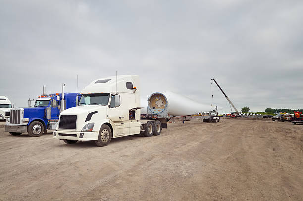 istock Big Rig And Wind Turbine Blades 184371231