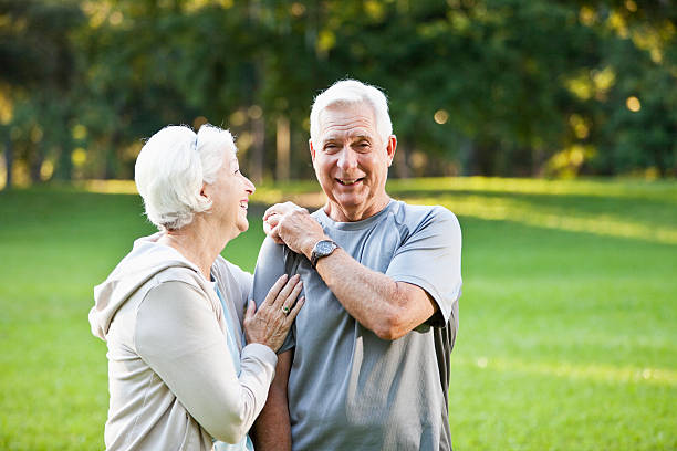 istock Senior couple at the park 184371378
