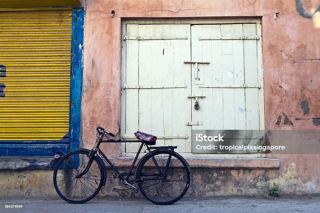 India, Diu, bicycle in alleyway. Alley Stock Photo