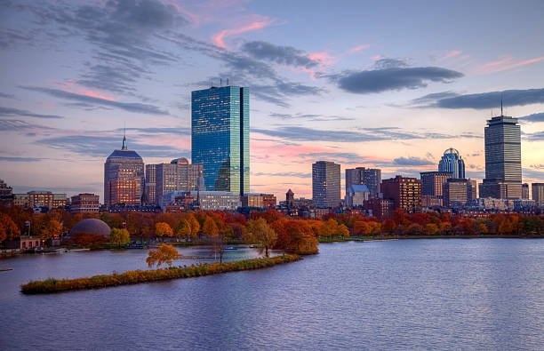 Back Bay, Boston Autumn colors along the Charles River and Boston's Back Bay neighborhood. Boston is the largest city in New England, the capital of the state of Massachusetts. Boston is known for its central role in American history,world-class educational institutions, cultural facilities, and champion sports franchises. massachusetts photos stock pictures, royalty-free photos & images