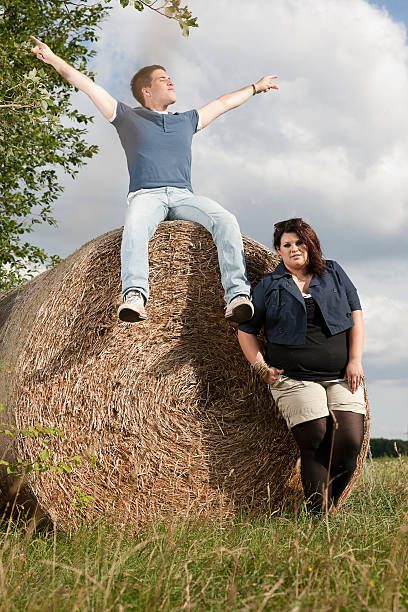 istock Young couple relaxing outdoors. 184372082