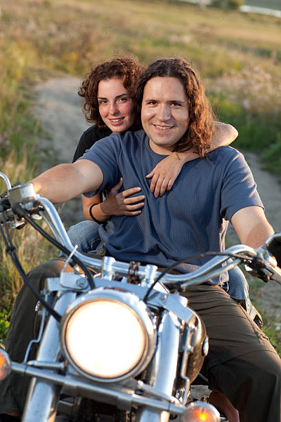 istock Happy Couple on Bike 184372088