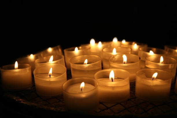 istock A selection of lit round candles 184372538