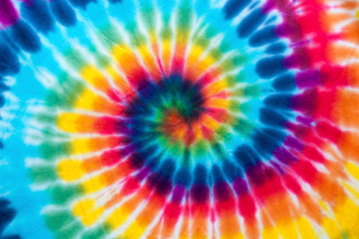 Full frame multi coloured tie dyed fabric