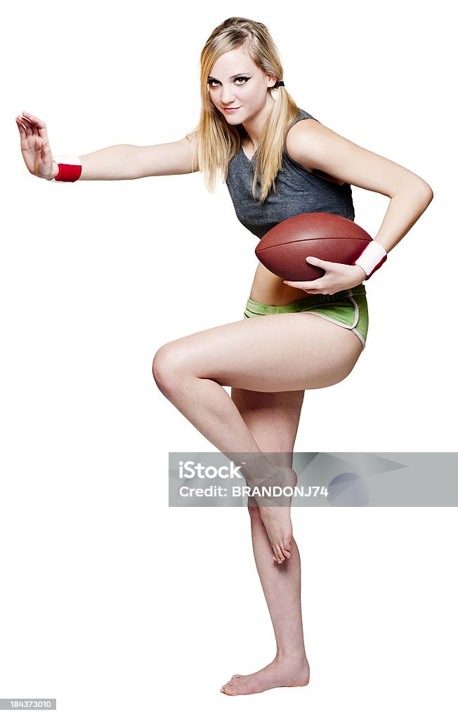 Attraktive Mädchen im Football-Pose - Lizenzfrei Amerikanischer Football Stock-Foto