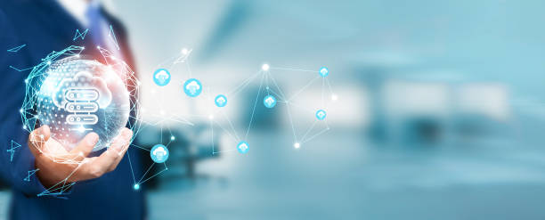 istock Businessman holds the circle of network structure to illustrate the cloud computing concept, scalability, and distributed network. This technology enables data storage. 1843731592