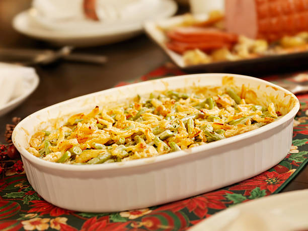 Traditional Green Bean Casserole "Green Bean Casserole with Crispy Onions, Glazed Ham, Scalloped Potatoes and Biscuits  -Photographed on Hasselblad H3D2-39mb Camera" side dish stock pictures, royalty-free photos & images
