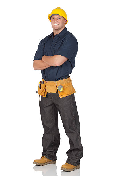 istock Manual worker standing with arms crossed 184374571