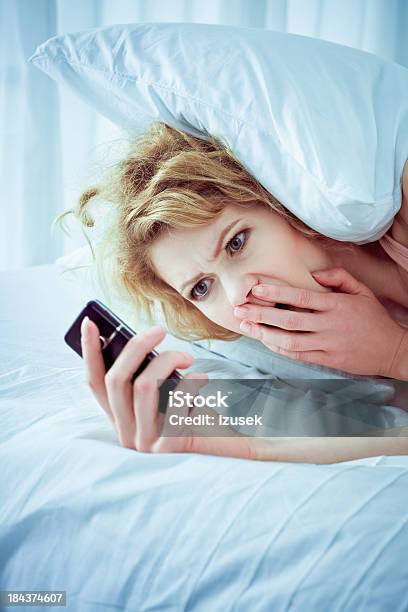 Bad News Stock Photo - Download Image Now - Surprise, Waking up, Young Women