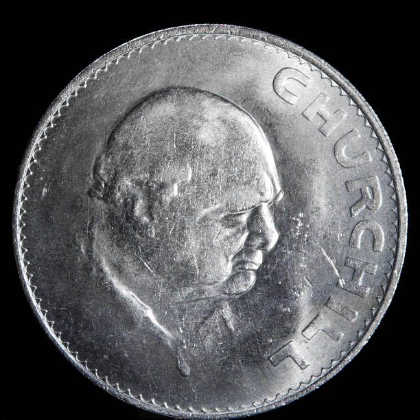 Winston Churchill Commemorative Coin Commemorative Crown Coin minted in 1965 to commemorate the death of Winston Churchill. This was the first time a non-monarch or commoner was ever placed on a British coinRelated images: winston churchill prime minister stock pictures, royalty-free photos & images