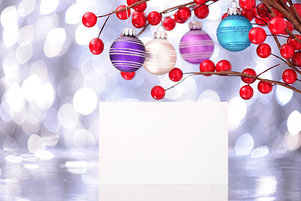 istock Colorful christmas baubles with an empty card 184374629