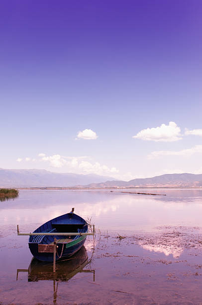 istock Old Fishing boat resting on beautiful sunset 184374649
